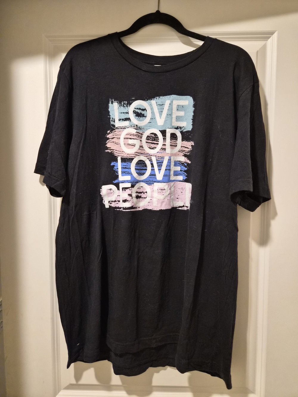 Bella Canvas Black Tee with Pastel Blue and Pink Brushstroke Graphic